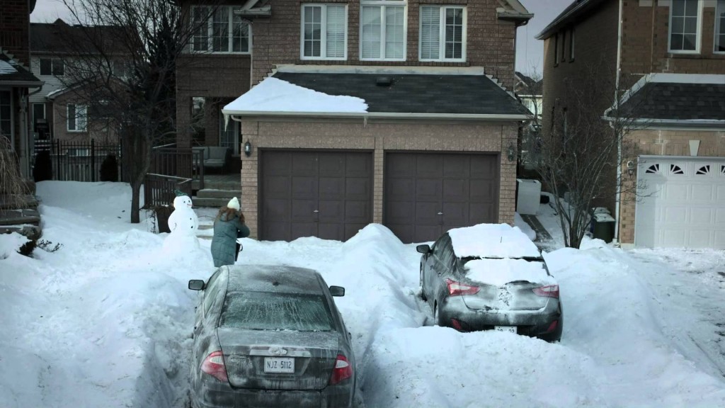 Commercial Woman Hits Snowman | woman takes her winter weather frustrations out on snowman Commercial Woman Hits Snowman | woman takes her winter weather frustrations out on snowman